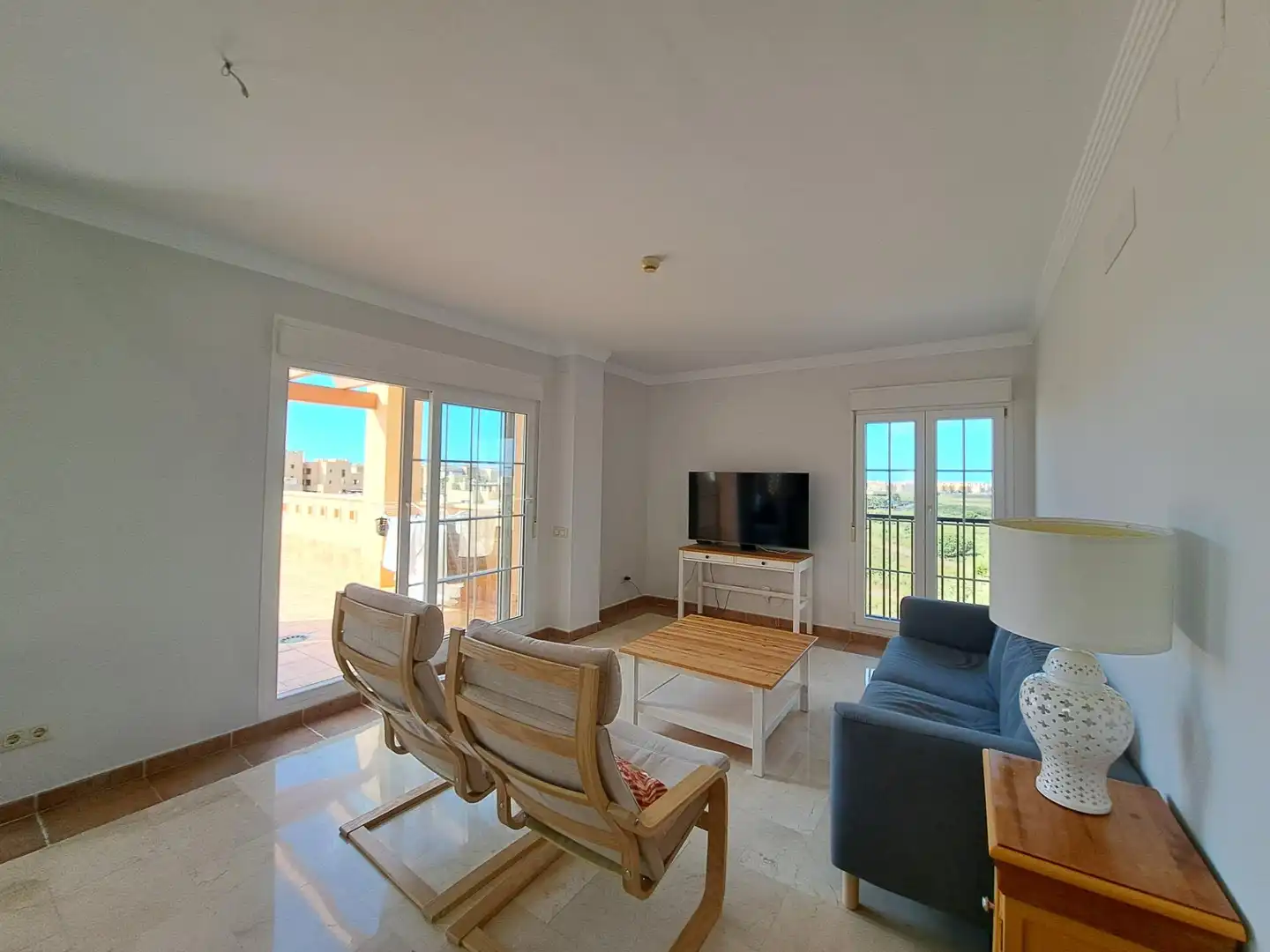 Sala de estar de Ático en venta en Ayamonte con Terraza y Piscina comunitaria