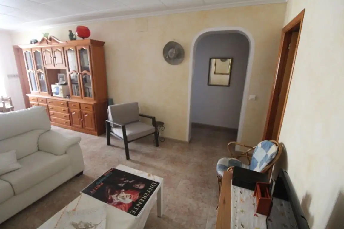 Sala de estar de Casa adosada en venta en Torrevieja con Aire acondicionado, Jardín privado y Terraza