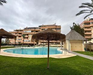 Swimming pool of Flat for sale in Torremolinos  with Air Conditioner, Private garden and Parquet flooring