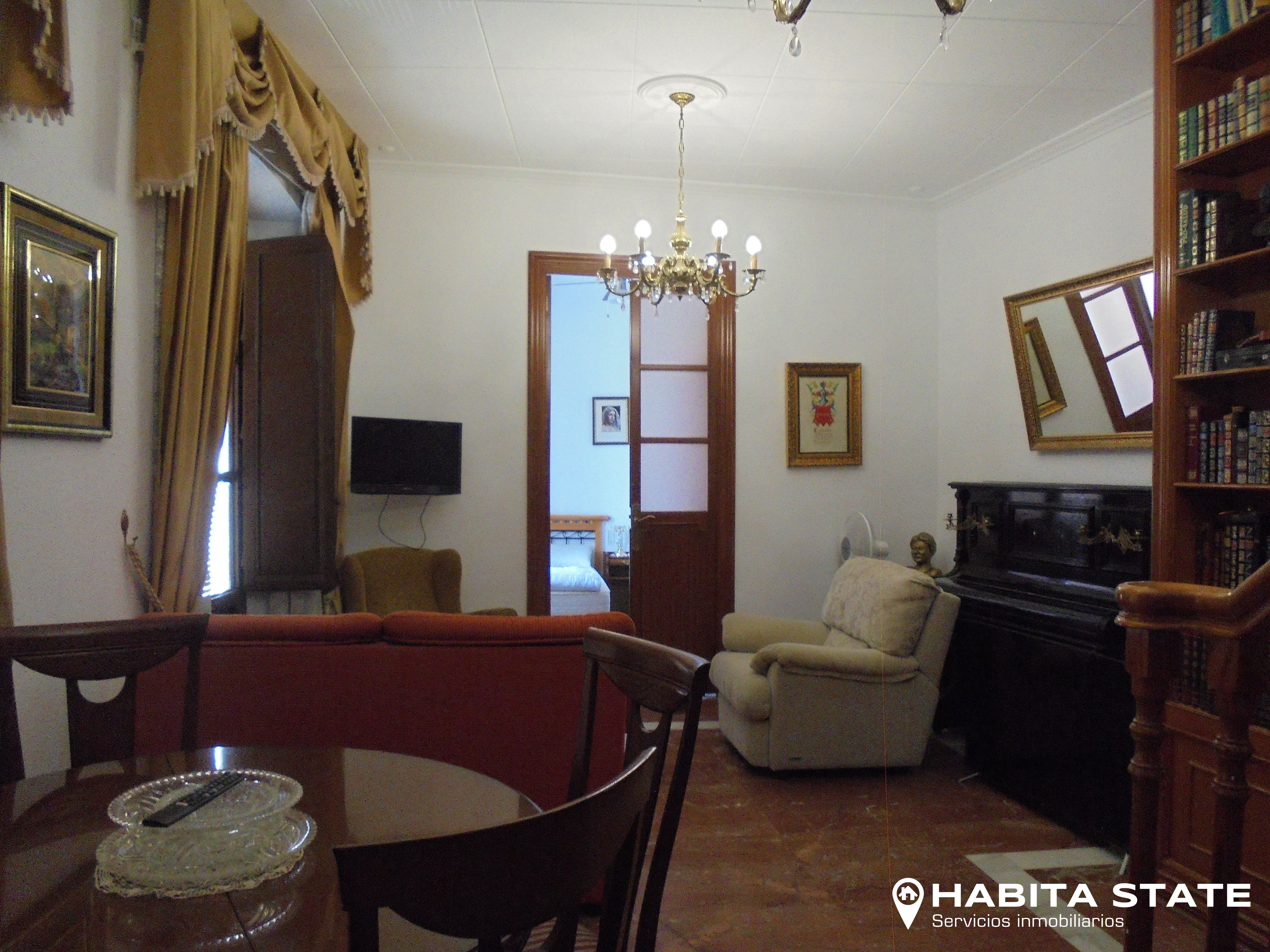 Sala d'estar de Casa adosada en venda en Tabernas amb Aire condicionat, Terrassa i Moblat