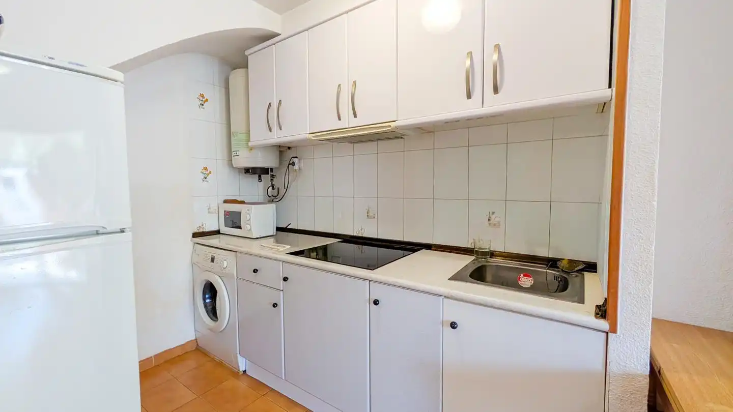 Cuina de Casa adosada en venda en Santa Pola amb Aire condicionat, Jardí privat i Terrassa