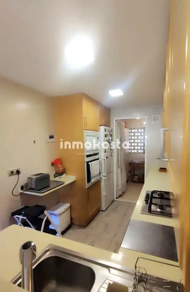 Kitchen of Flat for sale in L'Alfàs del Pi  with Air Conditioner, Terrace and Community pool