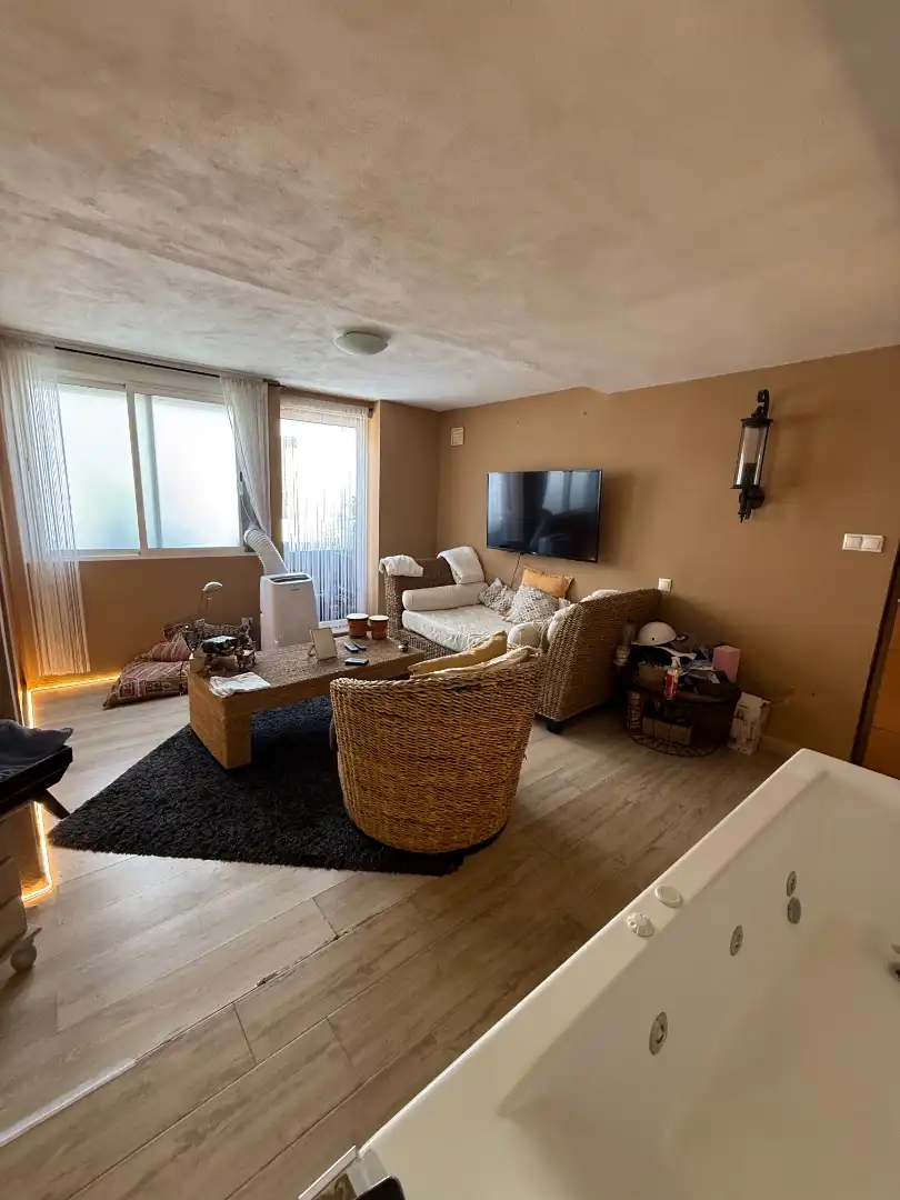 Sala de estar de Casa adosada en venta en Vinaròs con Aire acondicionado, Horno y Balcón