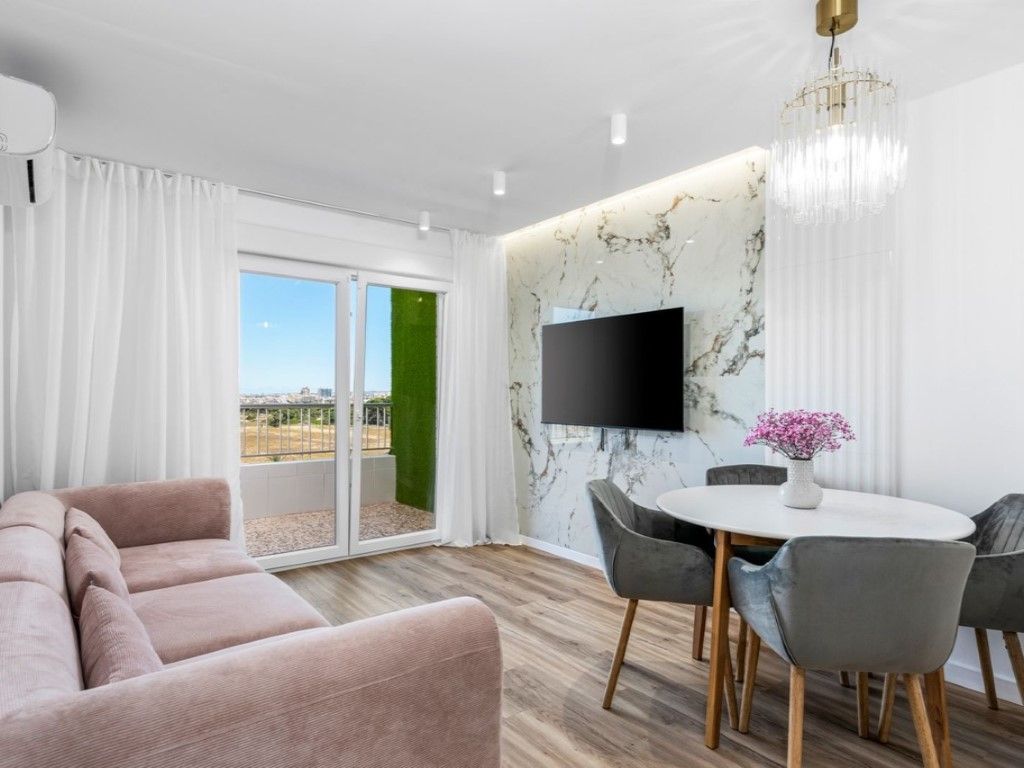 Sala d'estar de Apartament en venda en Torrevieja amb Aire condicionat i Piscina comunitària
