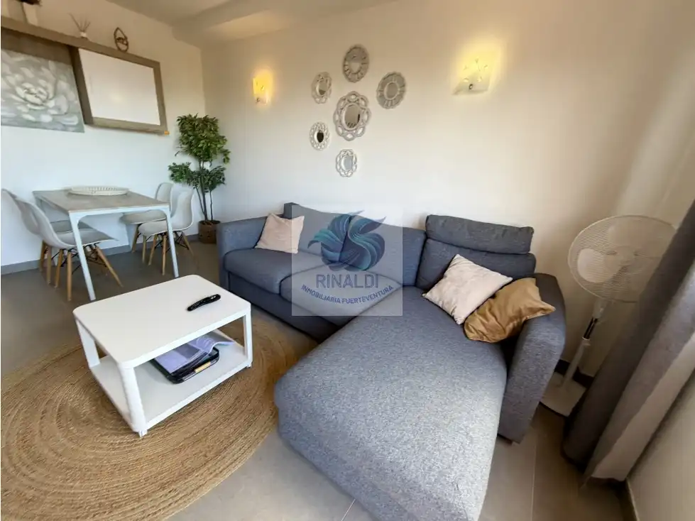 Sala de estar de Apartamento en venta en La Oliva con Terraza, Piscina y Amueblado