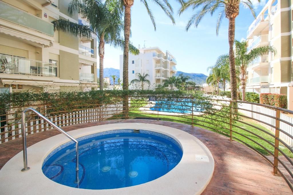Swimming pool of Attic for sale in Dénia  with Air Conditioner, Heating and Terrace
