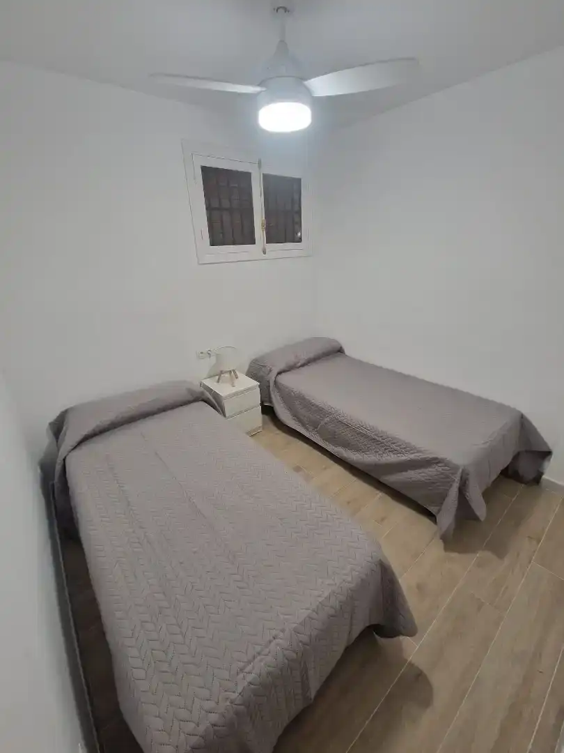 Dormitori de Apartament de lloguer en Cullera amb Piscina i Balcó