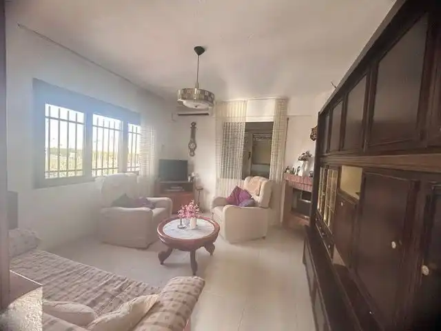 Sala d'estar de Casa o xalet en venda en Sagunto / Sagunt amb Terrassa i Moblat