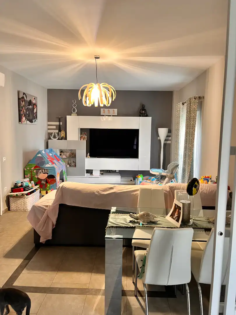 Sala d'estar de Casa o xalet en venda en La Algaba amb Aire condicionat, Terrassa i Moblat