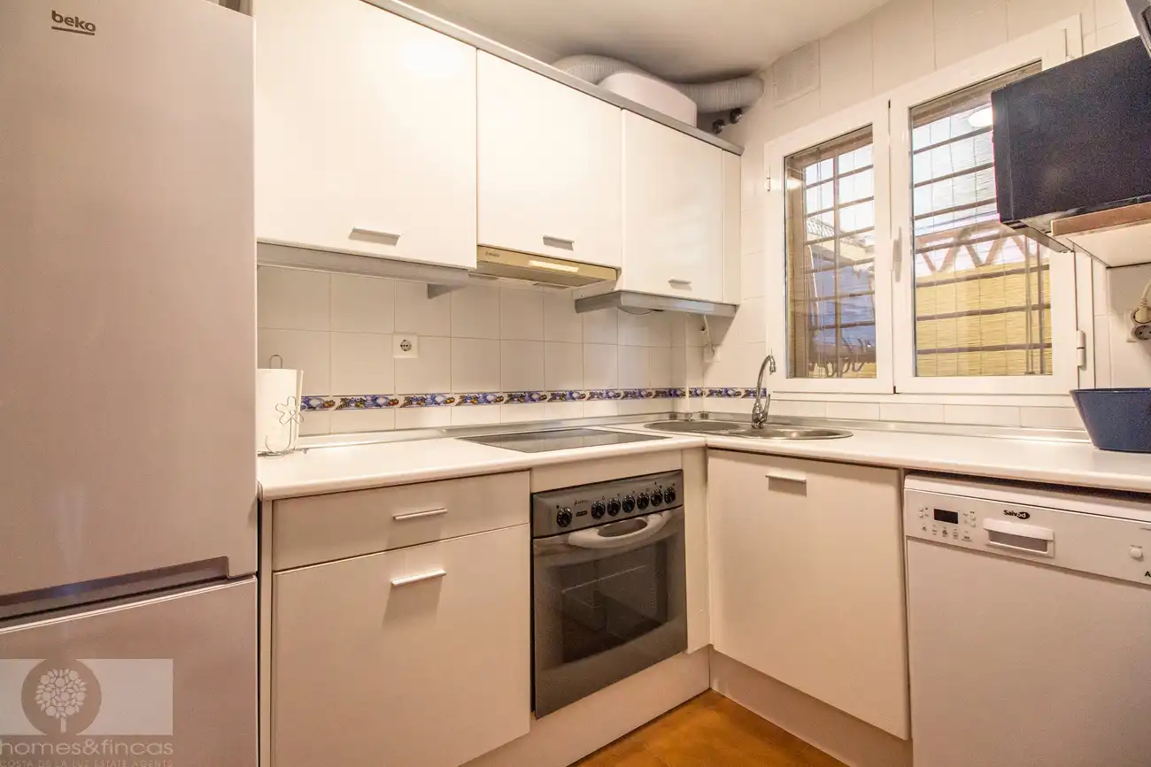 Kitchen of Detached homes for sale in Islantilla  with Storage room and Community pool