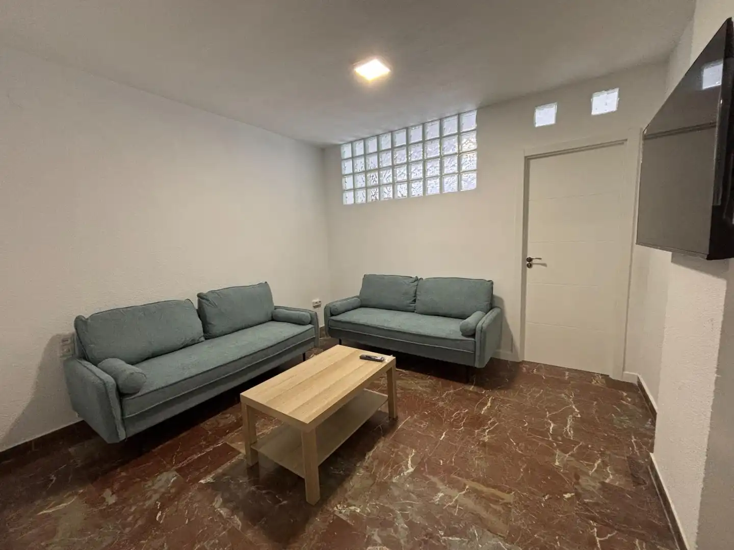 Sala de estar de Piso para compartir en Granada con Calefacción y Amueblado