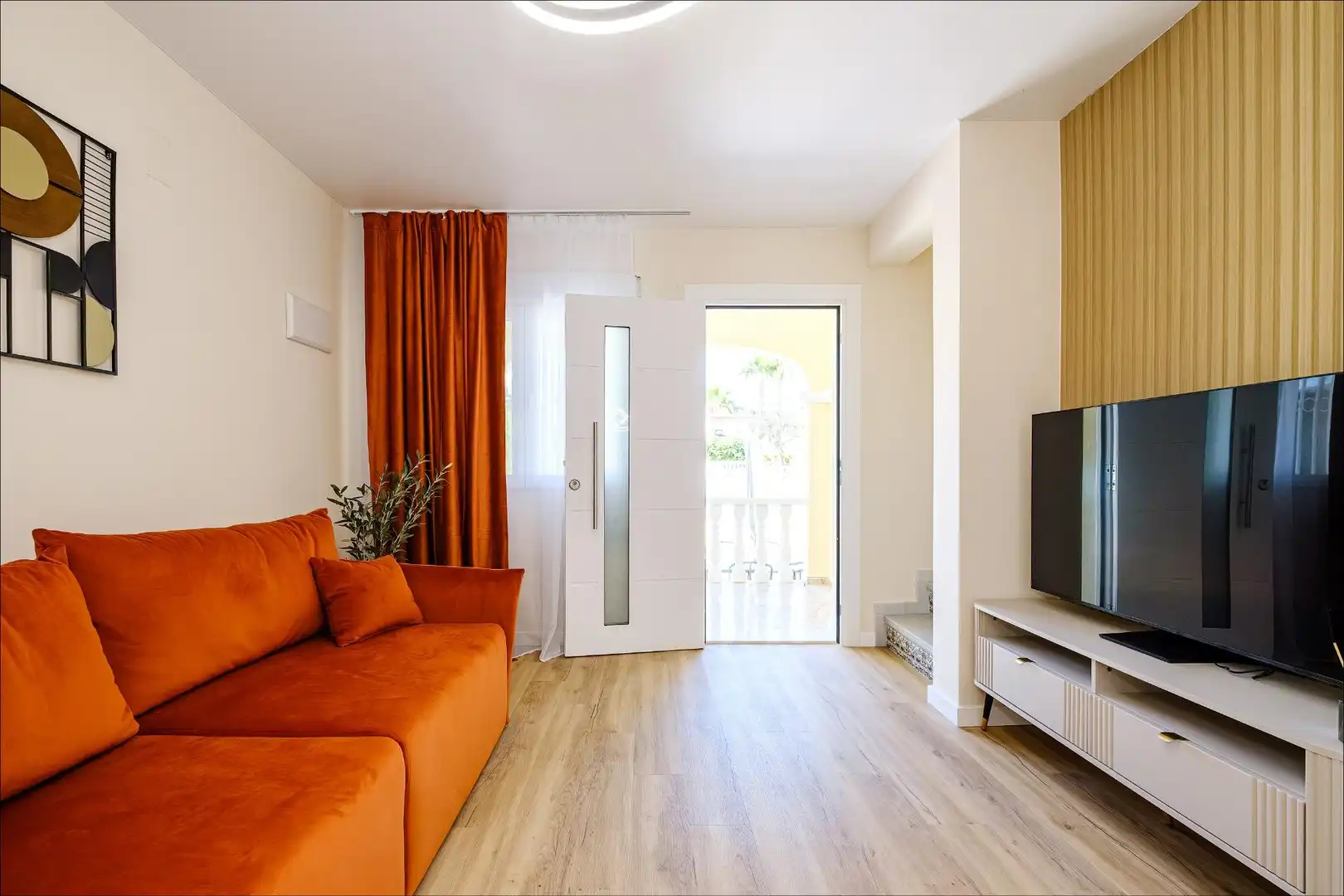Sala de estar de Casa adosada en venta en Orihuela con Aire acondicionado, Calefacción y Jardín privado