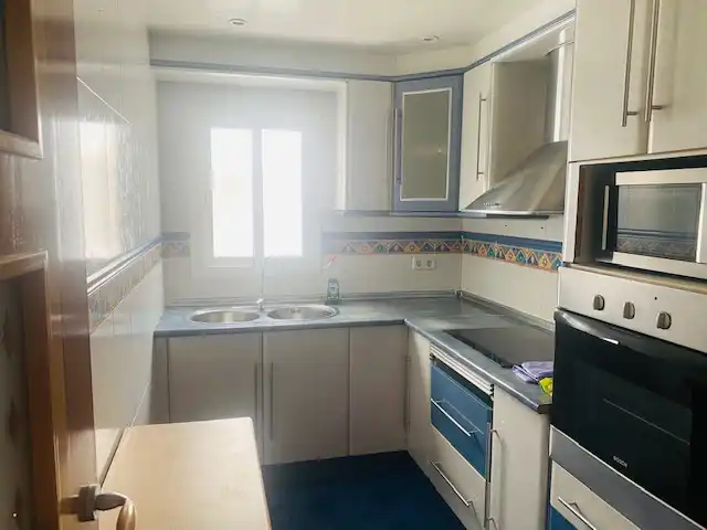 Küche von Dachboden zum Verkauf in Santa Coloma de Gramenet mit Parkett und Ofen