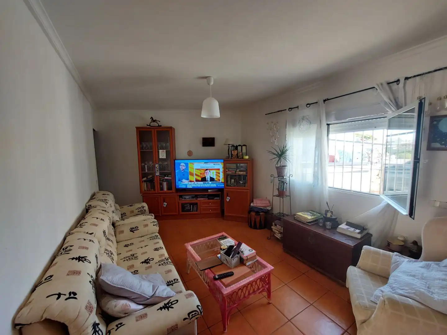 Sala de estar de Casa adosada en venta en Dénia con Jardín privado y Amueblado