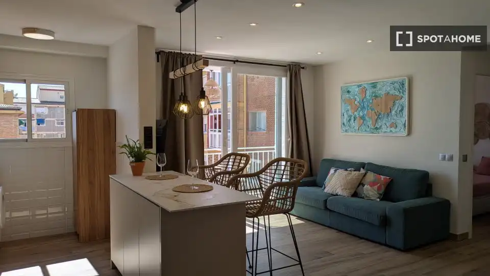 Sala d'estar de Apartament per a compartir en Málaga amb Aire condicionat, Terrassa i Moblat