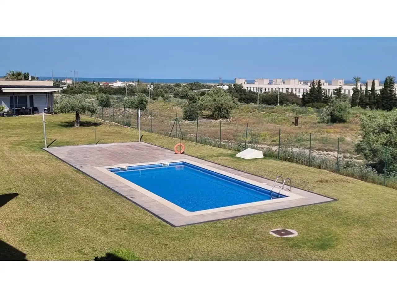 Swimming pool of Flat for sale in L'Ampolla  with Air Conditioner, Heating and Balcony