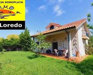 Vista exterior de Casa o xalet en venda en Ribamontán al Mar amb Calefacció, Jardí privat i Traster
