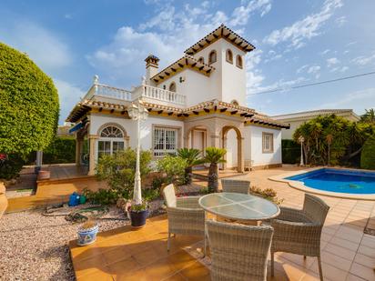 Exterior view of House or chalet for sale in Orihuela  with Air Conditioner, Heating and Private garden