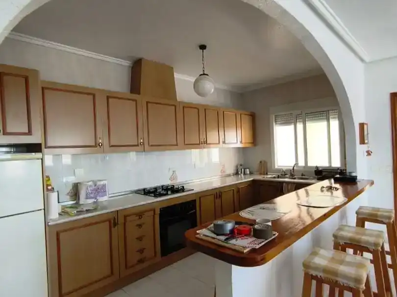 Cuina de Casa o xalet en venda en Rojales amb Jardí privat, Piscina i Moblat
