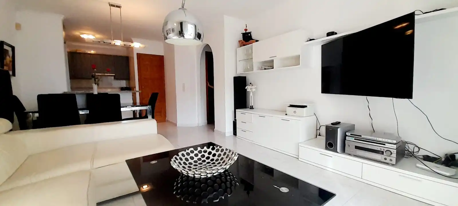 Wohnzimmer von Einfamilien-Reihenhaus zum Verkauf in Benitachell / El Poble Nou de Benitatxell mit Klimaanlage, Heizung und Terrasse