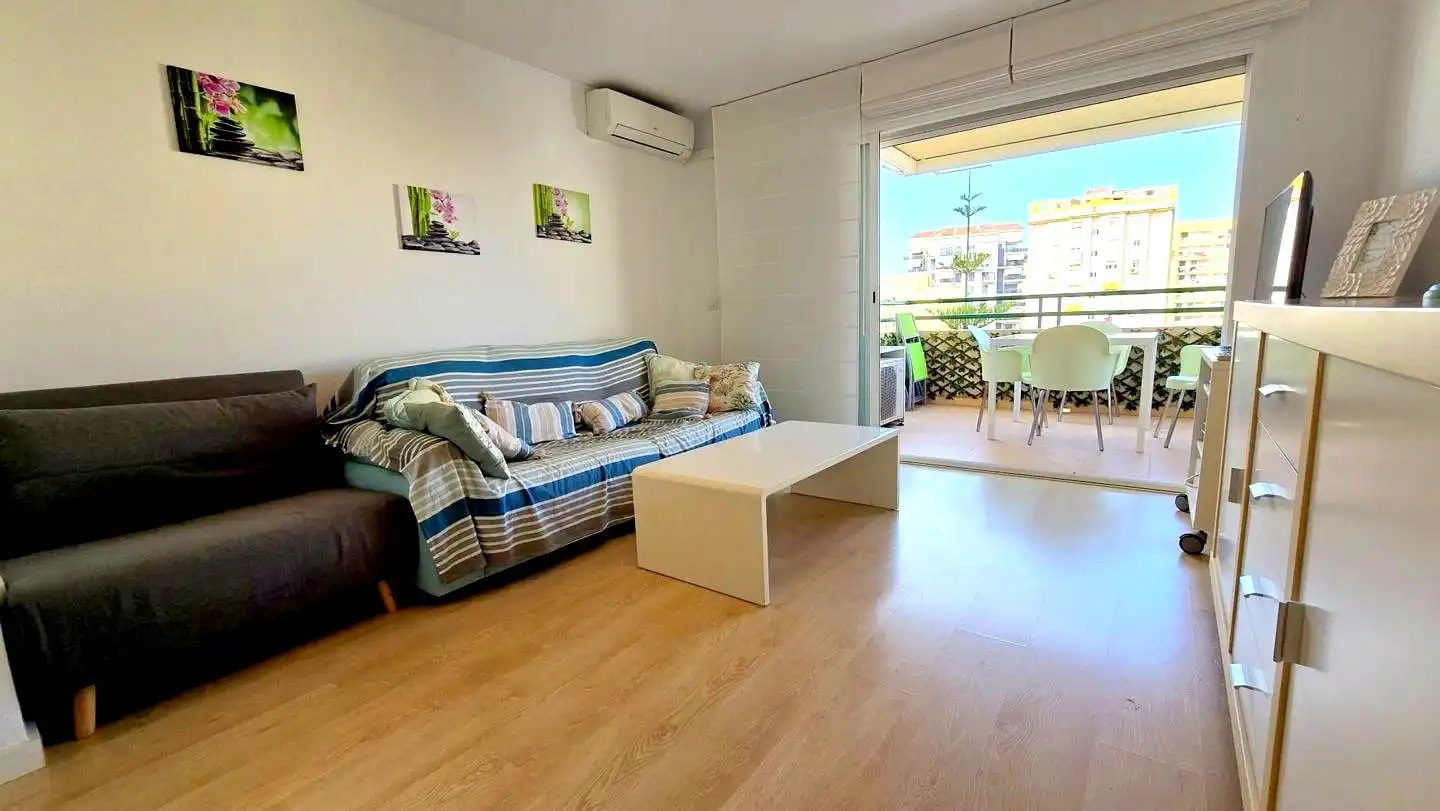 Sala d'estar de Apartament de lloguer en Gandia amb Aire condicionat, Parquet i Terrassa