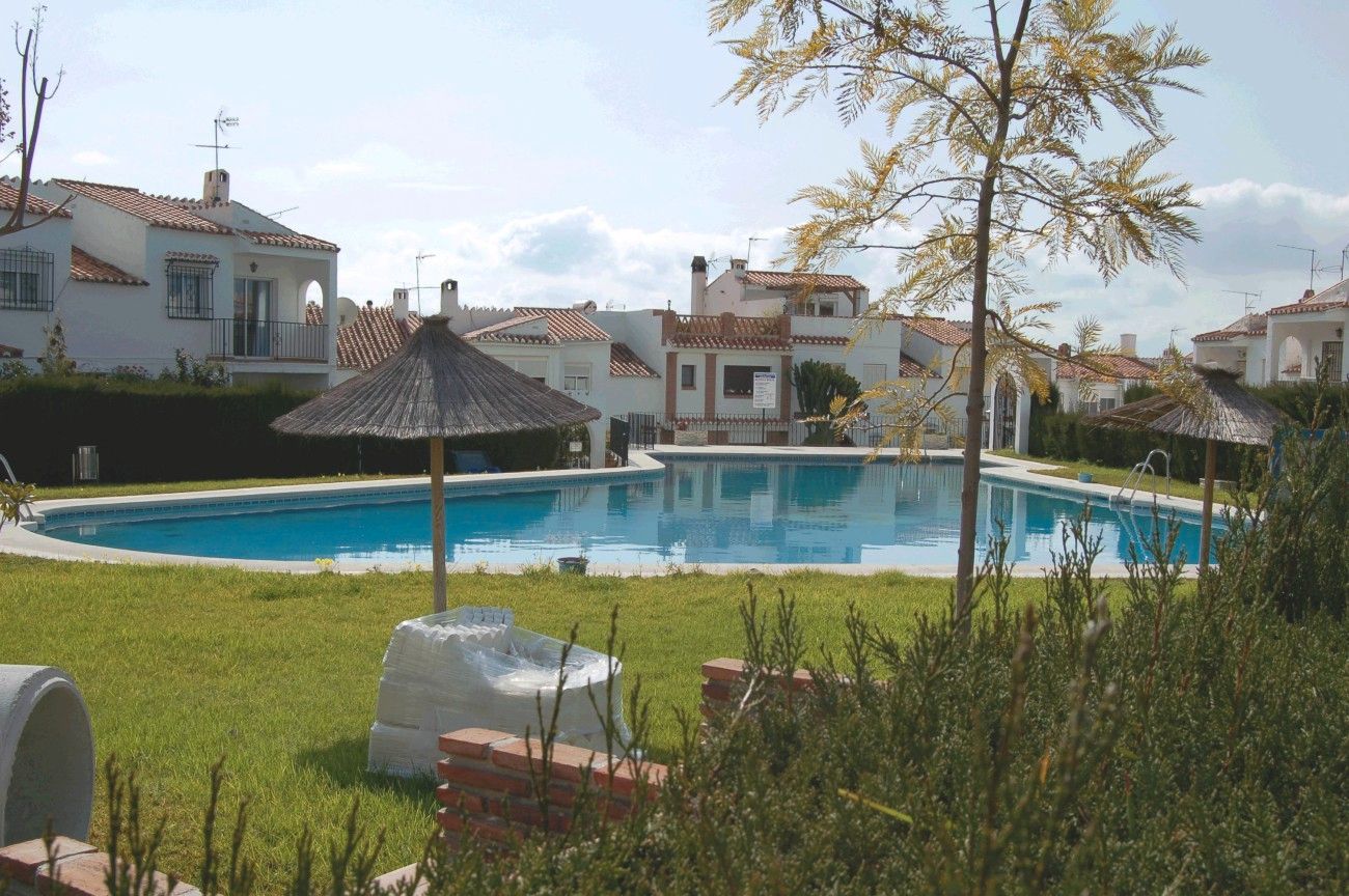 Swimming pool of Single-family semi-detached for sale in Nerja  with Air Conditioner, Heating and Terrace