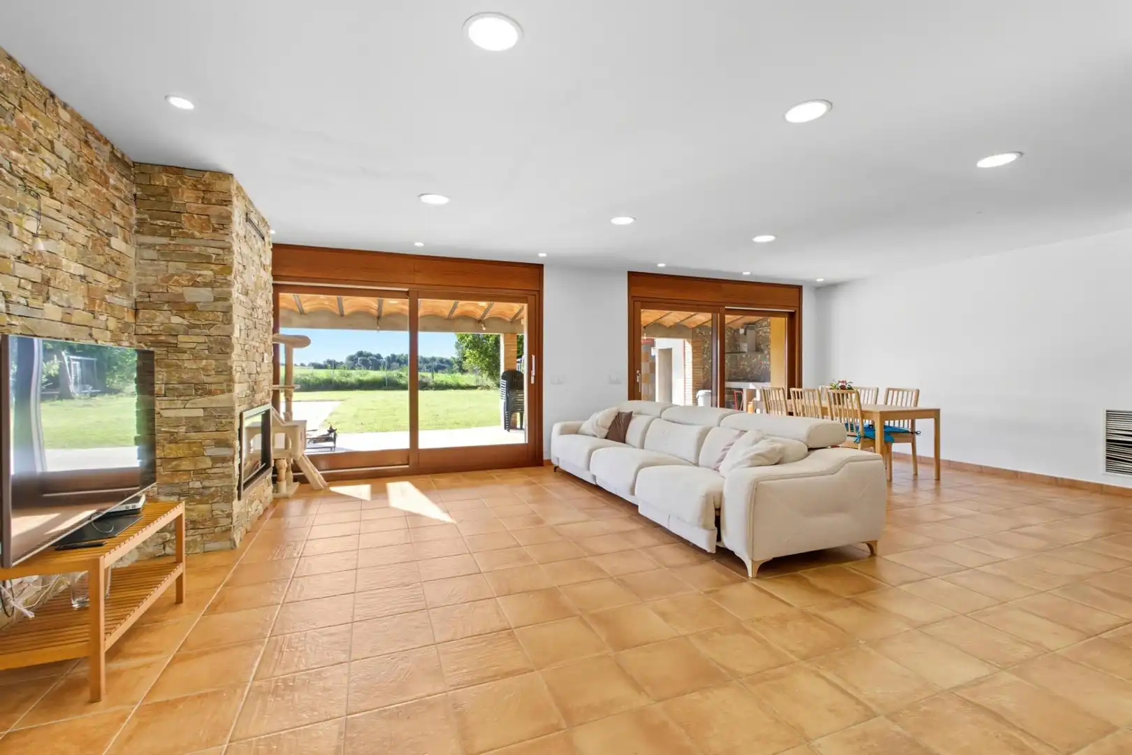 Living room of Country homes for sale in Garrigàs  with Private garden, Terrace and Swimming Pool