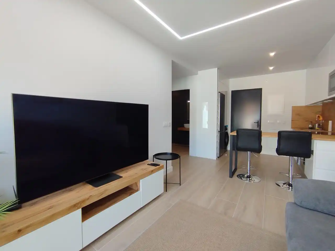Sala d'estar de Pis de lloguer en Mogán amb Aire condicionat, Terrassa i Moblat