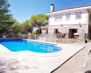 Exterior view of House or chalet for sale in Colmenarejo  with Terrace and Swimming Pool