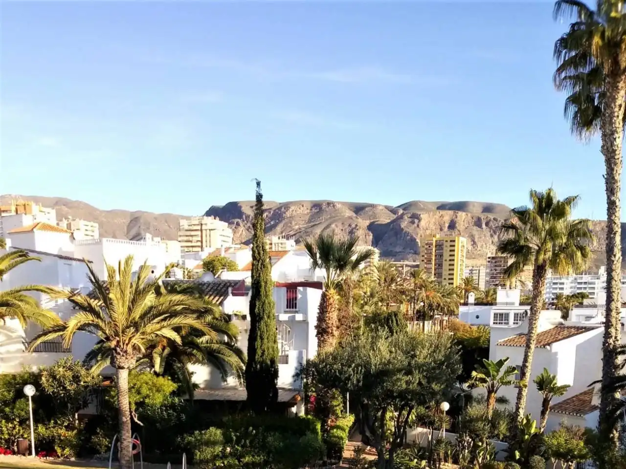 Exterior view of Detached homes for sale in Roquetas de Mar  with Community pool