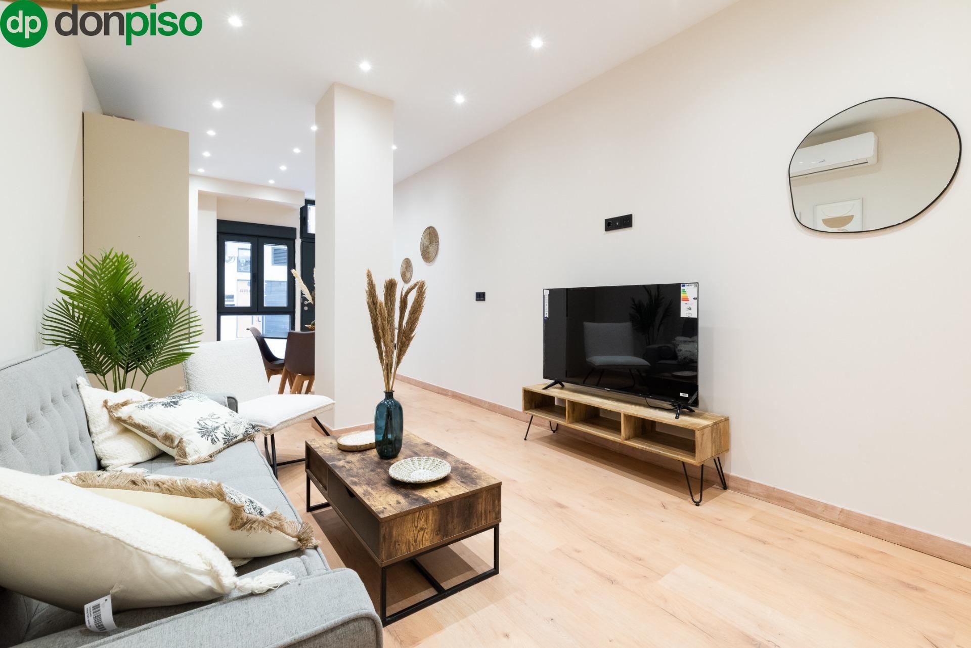 Living room of Lofts for sale in  Granada Capital  with Air Conditioner, Furnished and Alarm