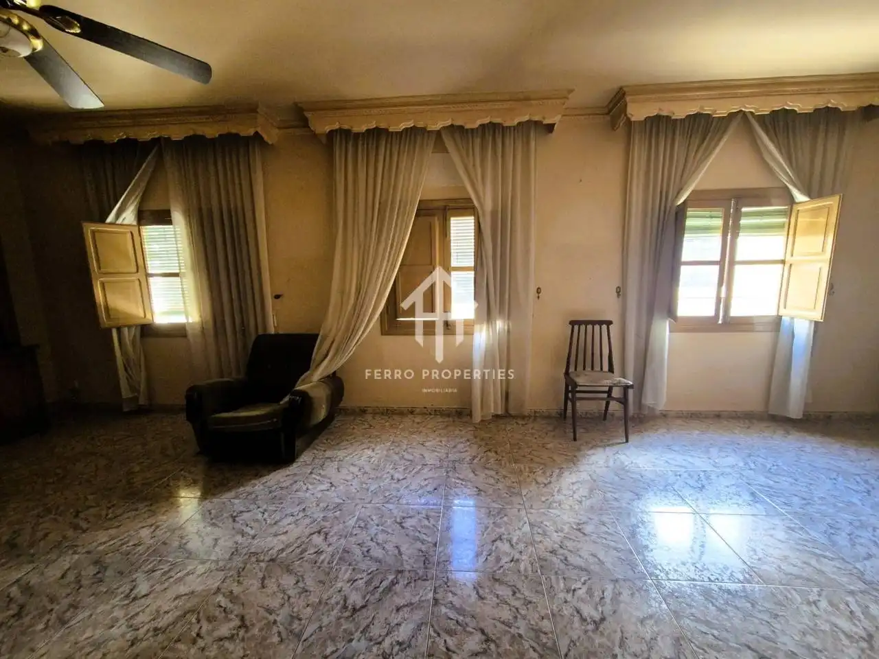 Sala d'estar de Casa o xalet en venda en Loja amb Jardí privat, Terrassa i Moblat