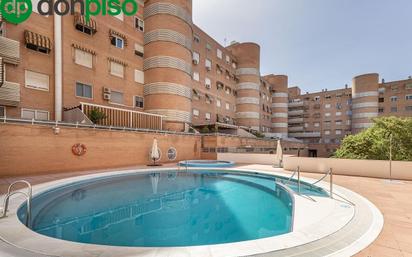 Swimming pool of Flat for sale in  Granada Capital  with Air Conditioner