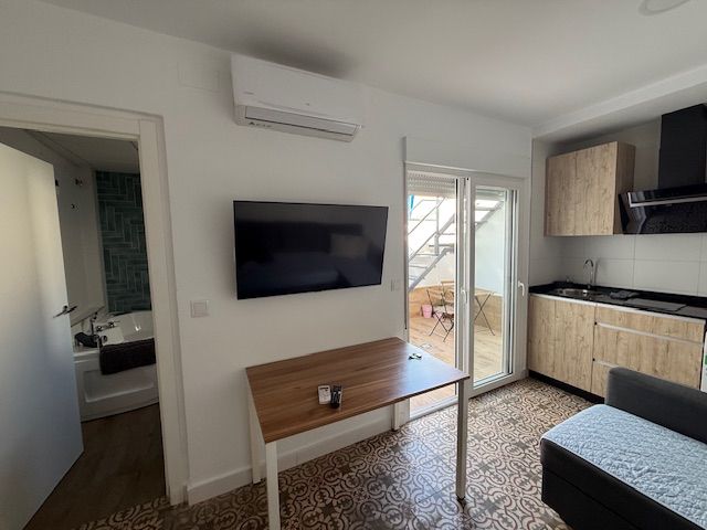 Living room of Single-family semi-detached for sale in Punta Umbría  with Air Conditioner, Heating and Terrace