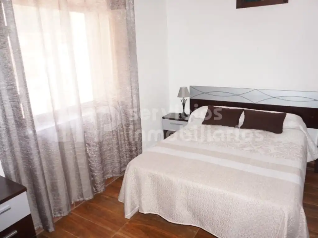 Habitación de Casa adosada en venta en Benamocarra con Jardín privado, Terraza y Amueblado