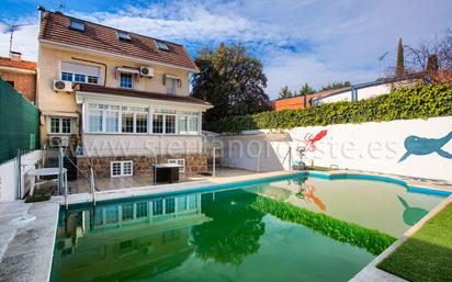 Swimming pool of Single-family semi-detached for sale in Pozuelo de Alarcón  with Air Conditioner, Terrace and Swimming Pool