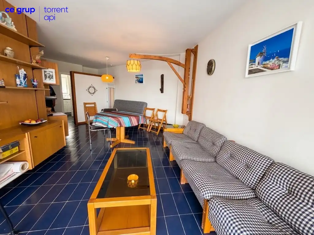 Living room of Flat for sale in L'Escala  with Terrace, Swimming Pool and Furnished