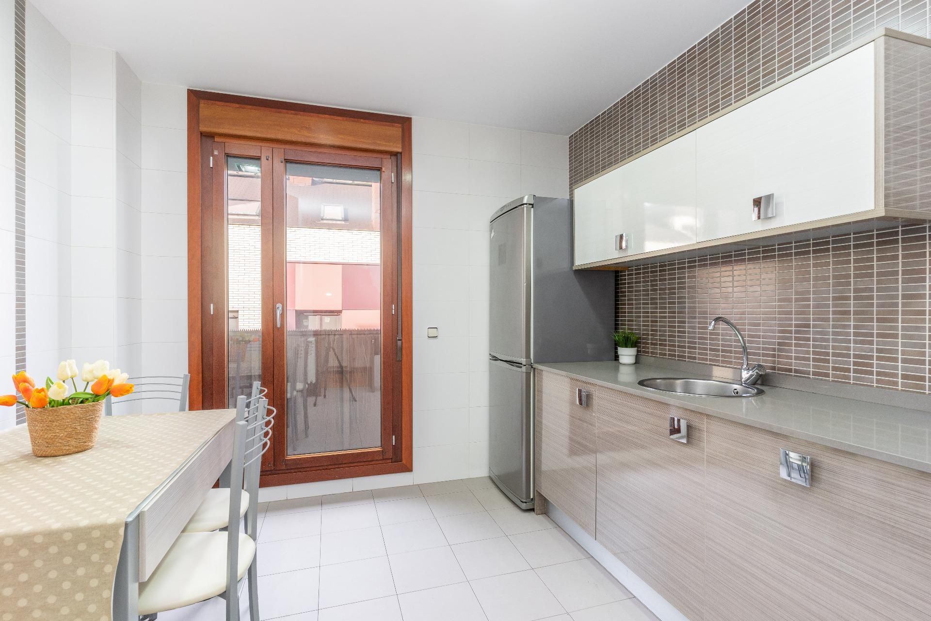Kitchen of Flat for sale in Gijón   with Heating, Terrace and Storage room