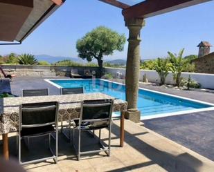 Piscina de Casa o xalet en venda en O Grove   amb Terrassa i Piscina