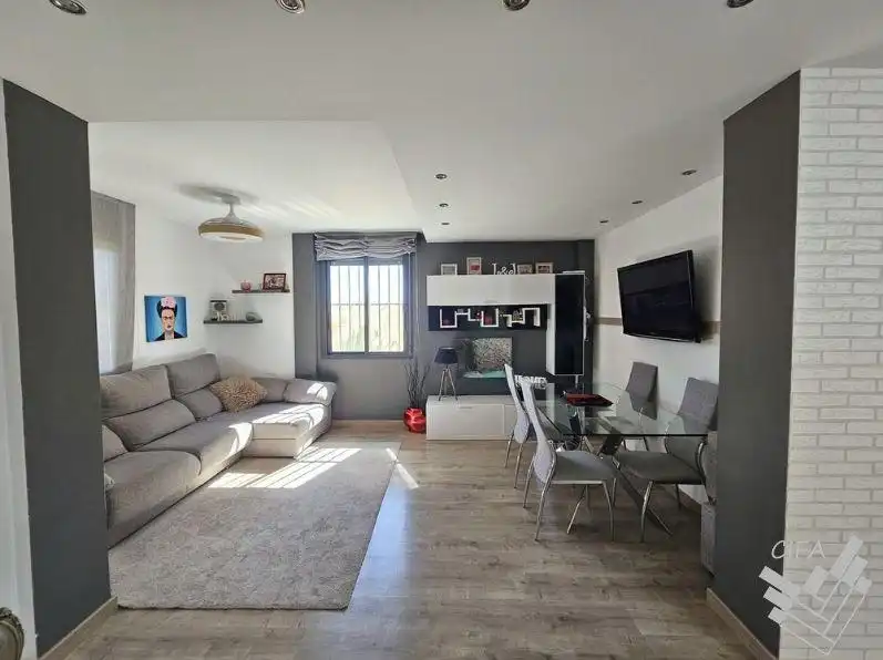 Sala de estar de Casa adosada en venta en Peñíscola / Peníscola con Calefacción, Jardín privado y Trastero