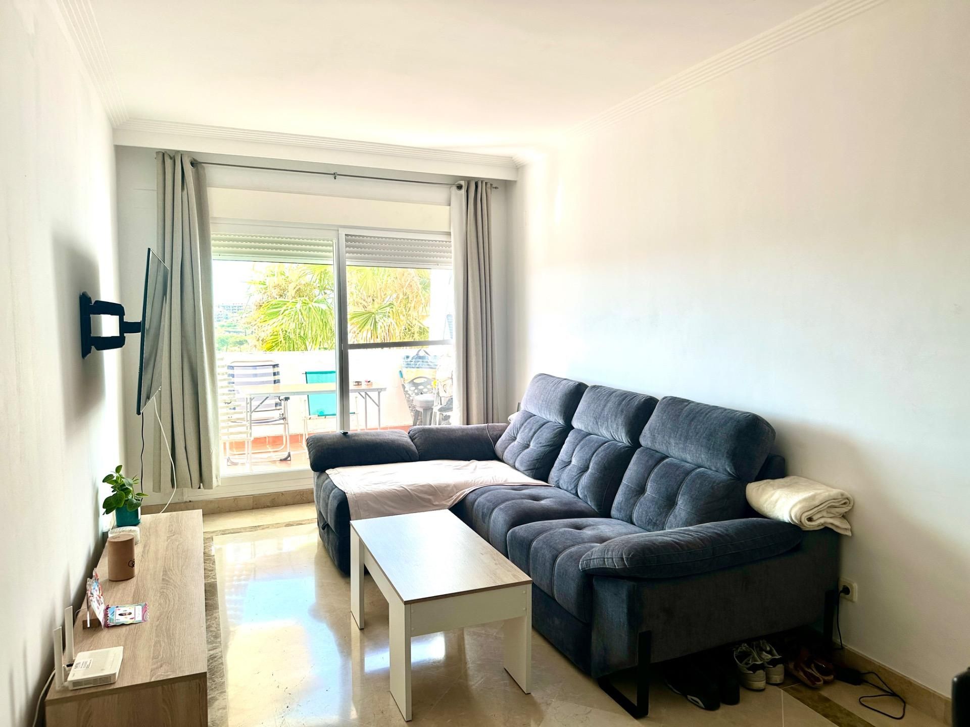 Sala d'estar de Apartament en venda en Mijas amb Aire condicionat, Jardí privat i Terrassa