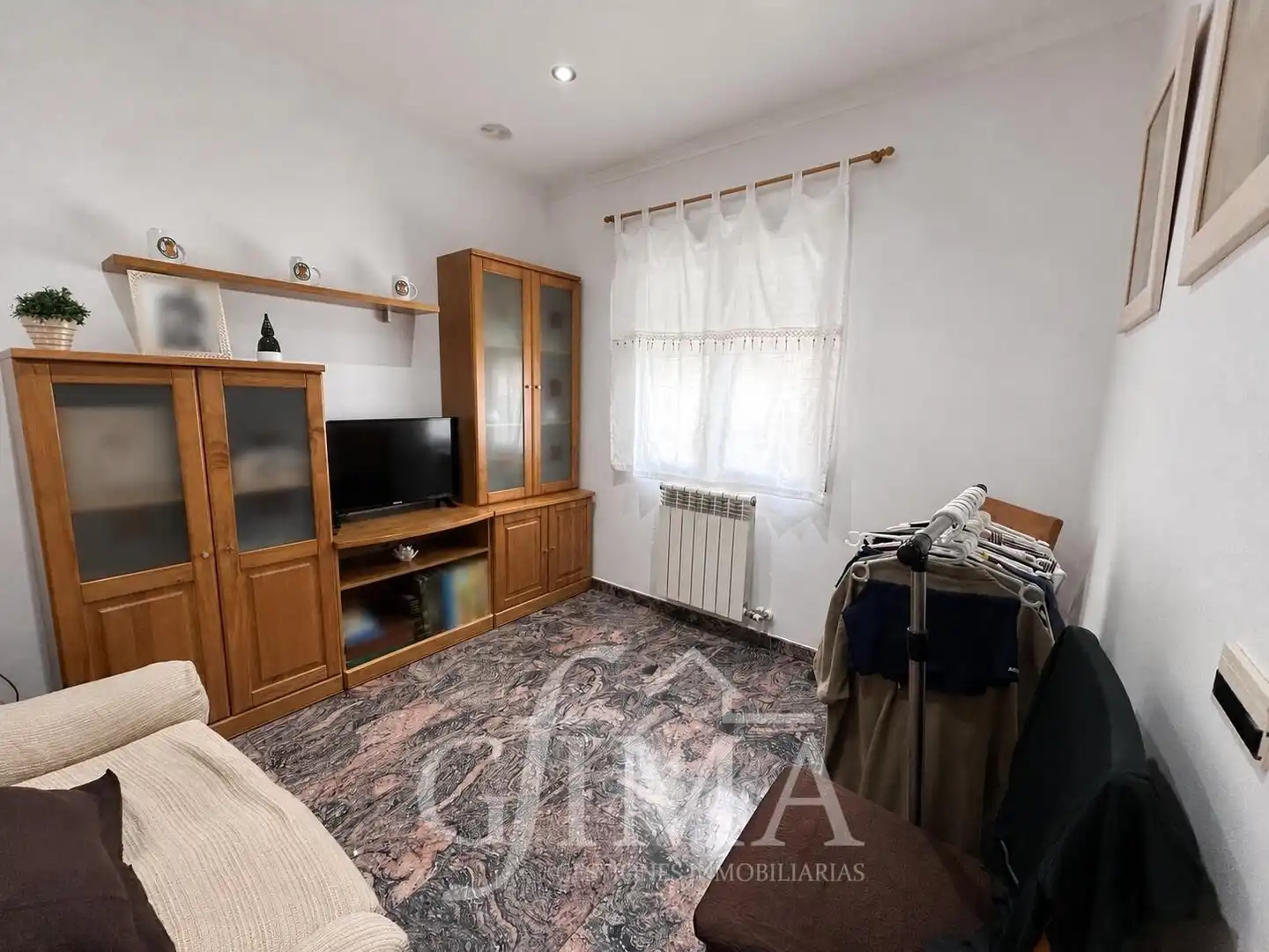 Habitación de Casa adosada en venta en Tomelloso con Calefacción, Trastero y Amueblado