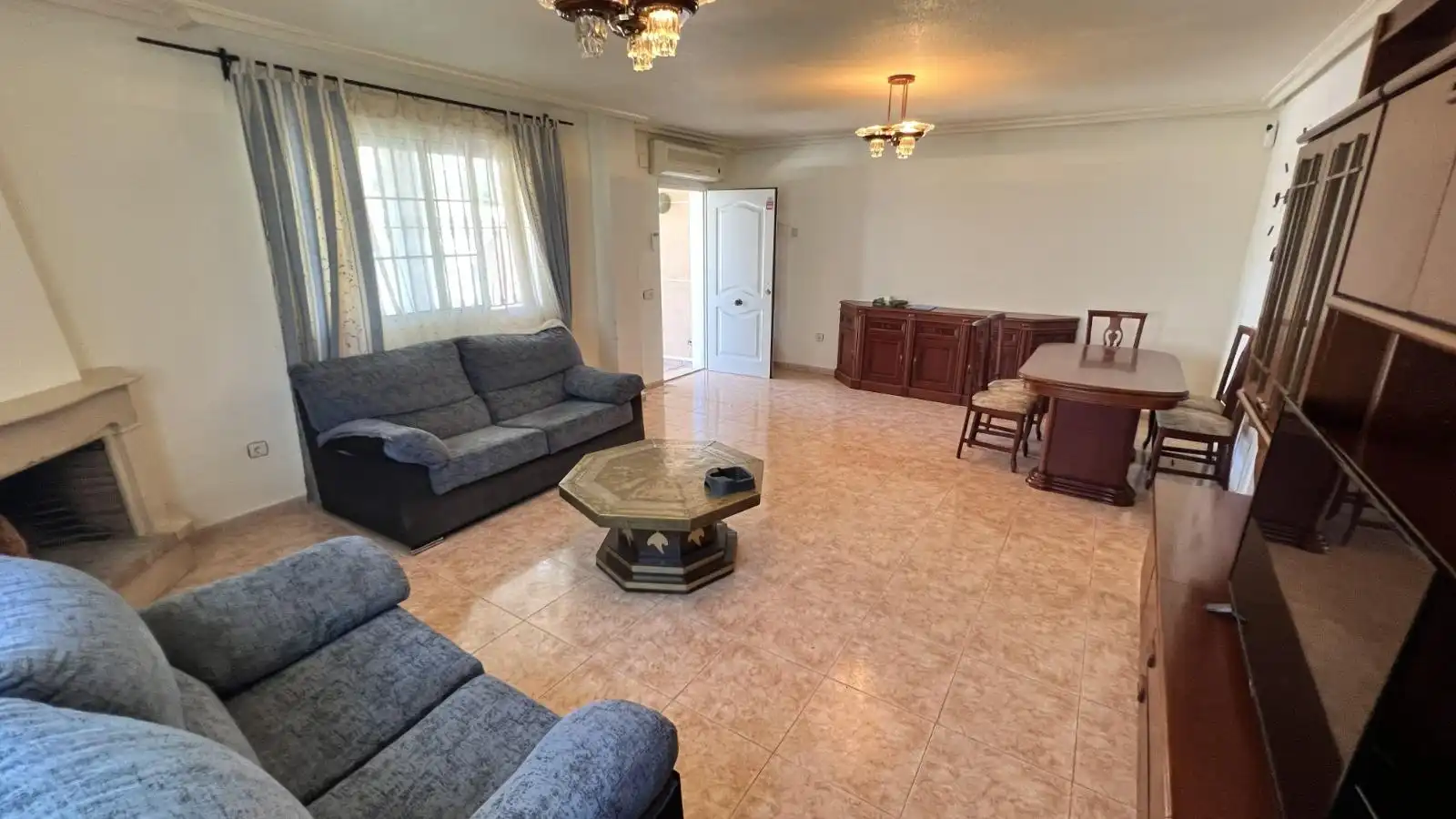 Sala de estar de Casa adosada en venta en Torrevieja con Aire acondicionado, Jardín privado y Terraza