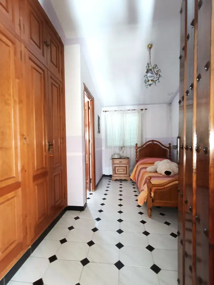 Dormitori de Casa adosada en venda en Villanueva del Ariscal amb Aire condicionat, Jardí privat i Terrassa