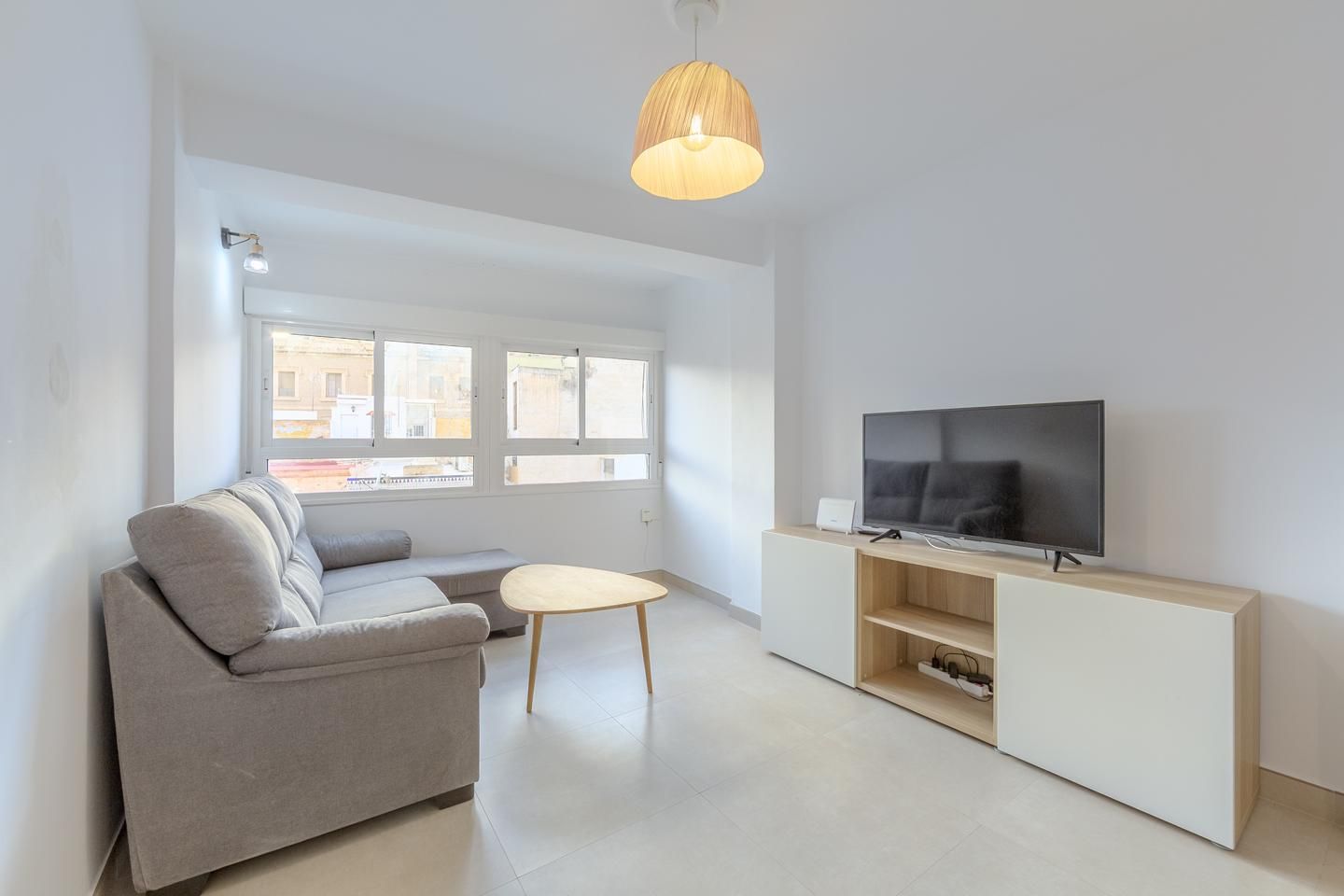 Living room of Flat for sale in  Almería Capital  with Air Conditioner and Furnished