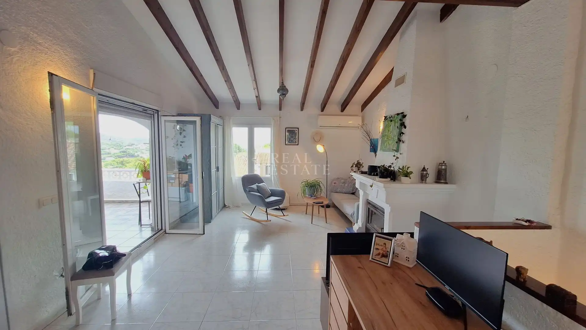 Living room of Detached homes for sale in Moraira  with Air Conditioner, Terrace and Storage room