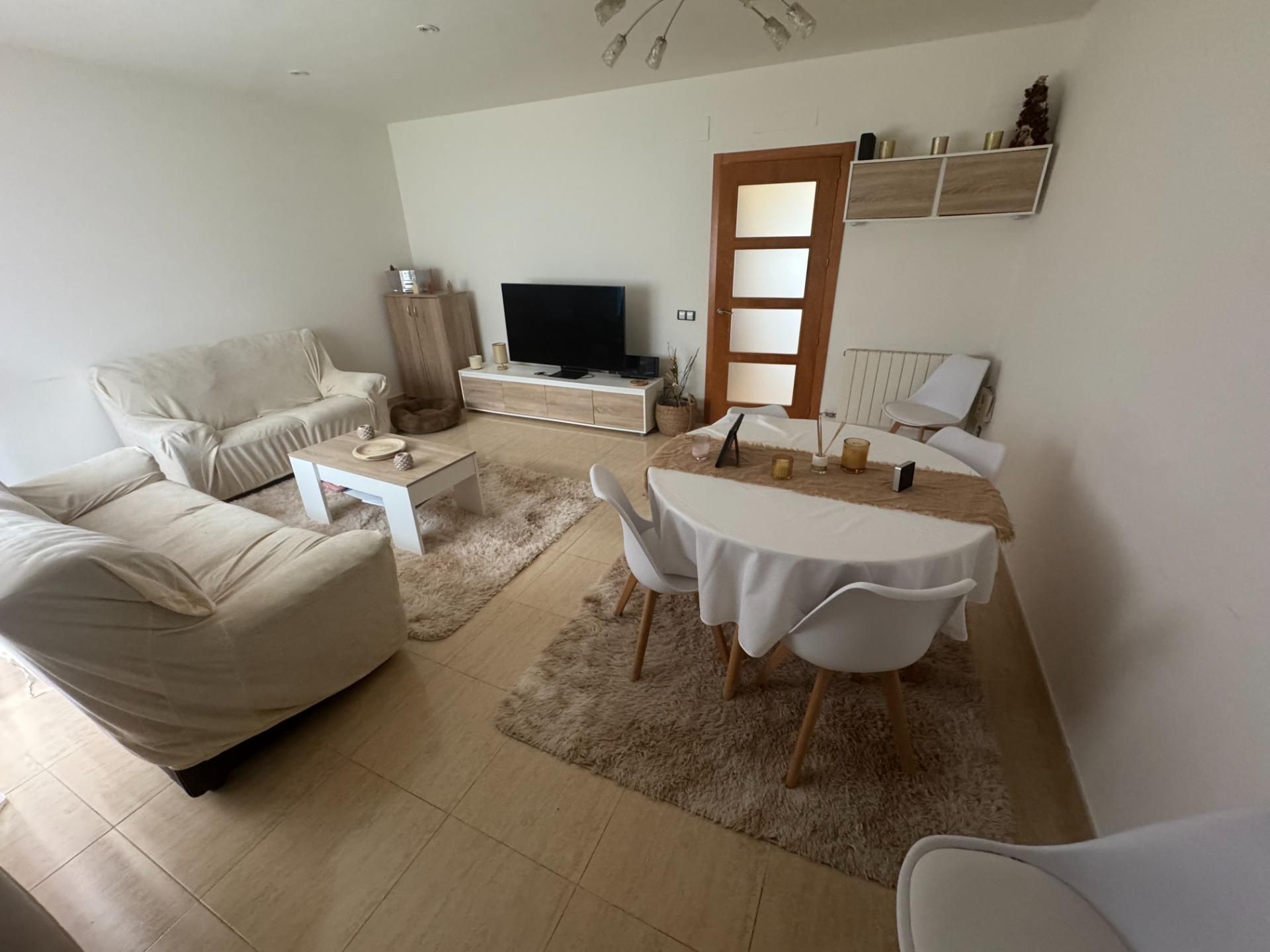 Sala de estar de Casa adosada en venta en Bellvei con Terraza