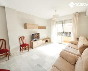 Living room of Flat for sale in  Granada Capital  with Heating and Balcony