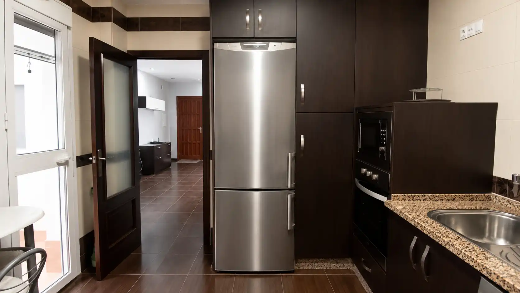 Cocina de Casa adosada en venta en Lora del Río con Aire acondicionado, Terraza y Trastero
