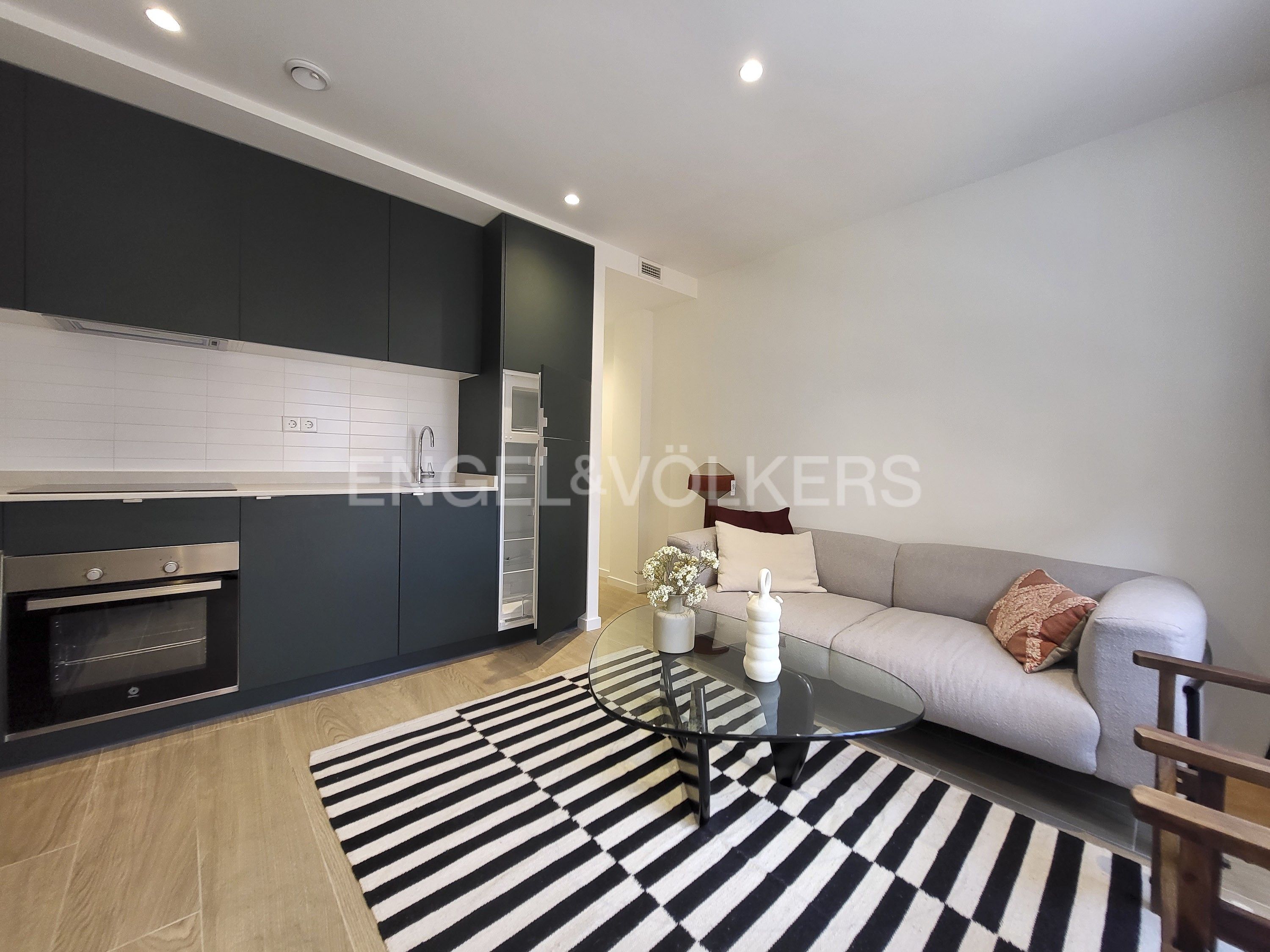 Sala de estar de Apartamento de alquiler en  Madrid Capital con Aire acondicionado, Calefacción y Amueblado